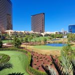 Panoramic view of a lush green golf course at Wynn Golf Club. Smooth