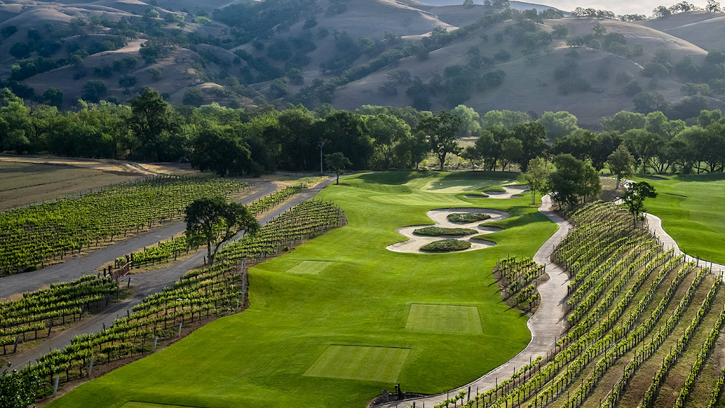 Panoramic view of a lush green golf course at Yocha Dehe Golf Club. Smooth